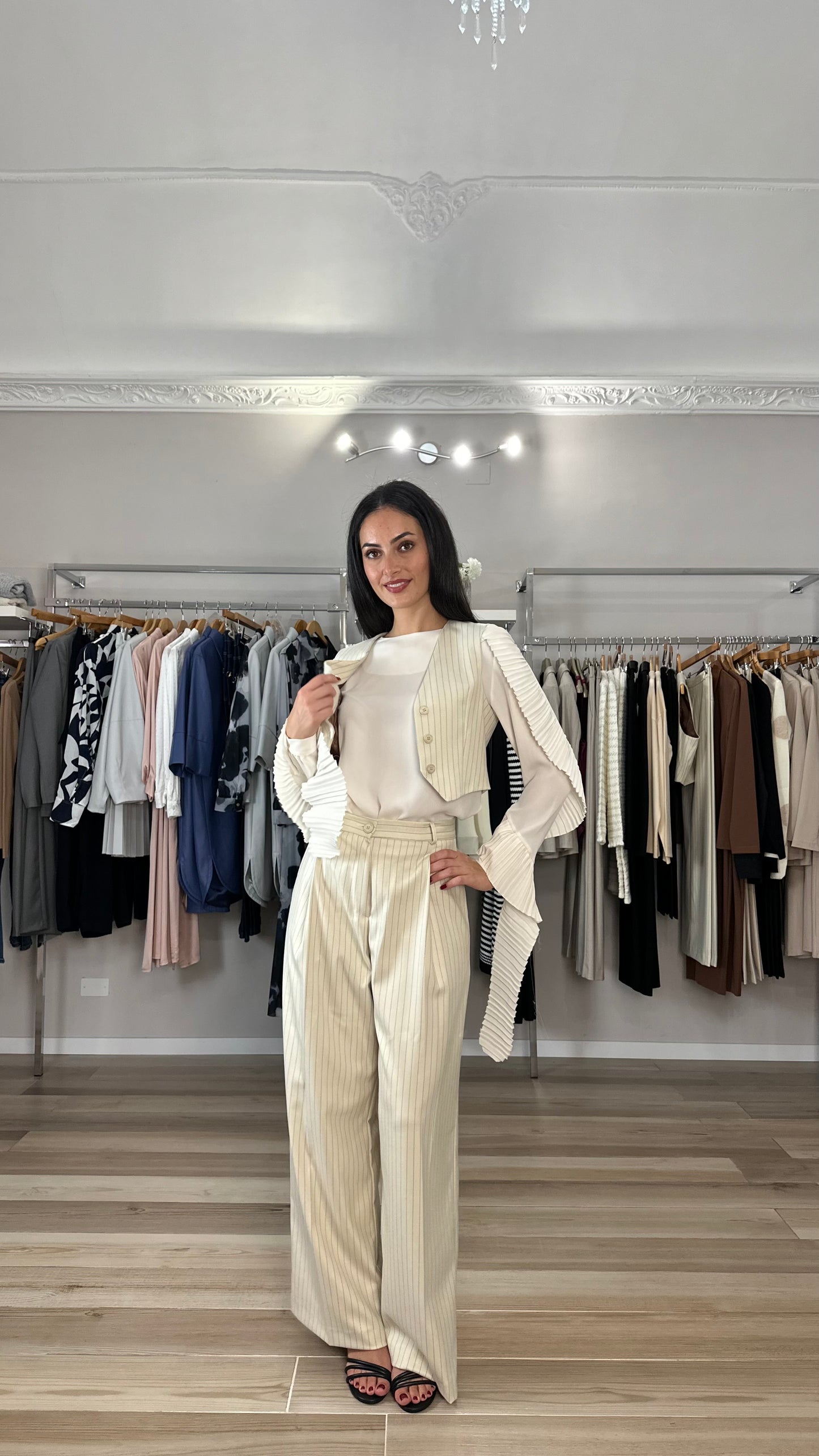 Blusa Souvenir plissè panna dettaglio