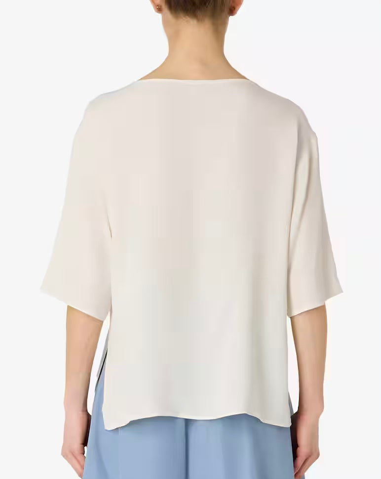 EmmeMarellablusainsetapannafrontale