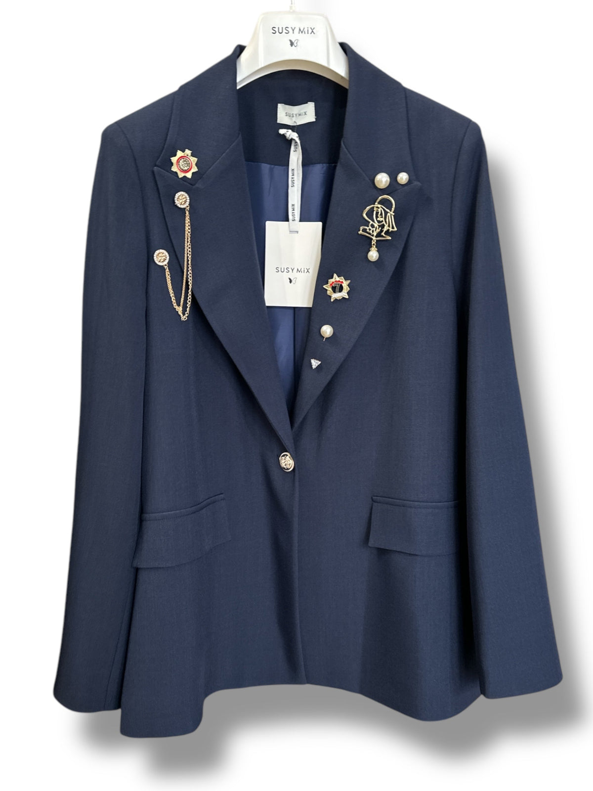 Giacca blu con spille
