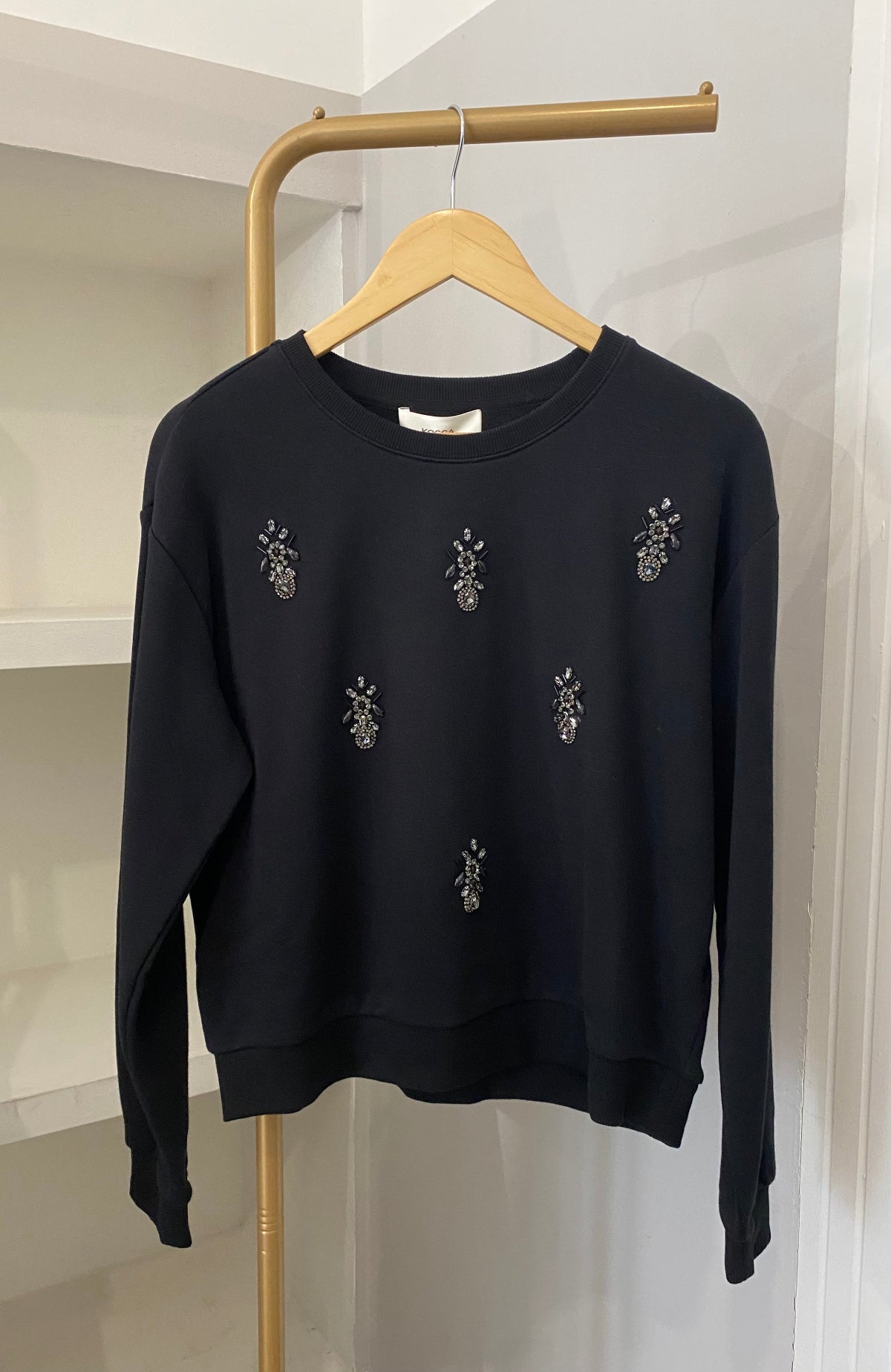 Kocca felpa con pietre gioiello