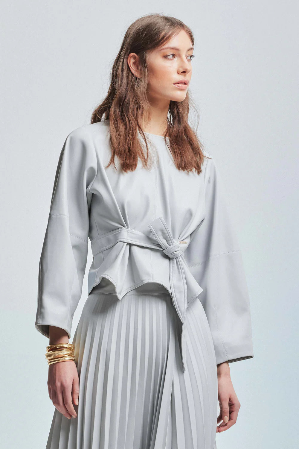 Kocca blusa corta in ecopelle