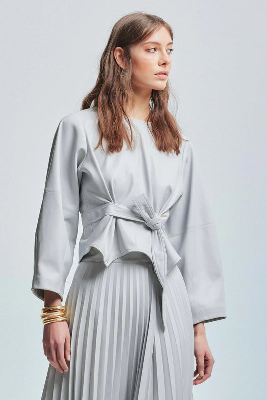 Kocca blusa corta in ecopelle