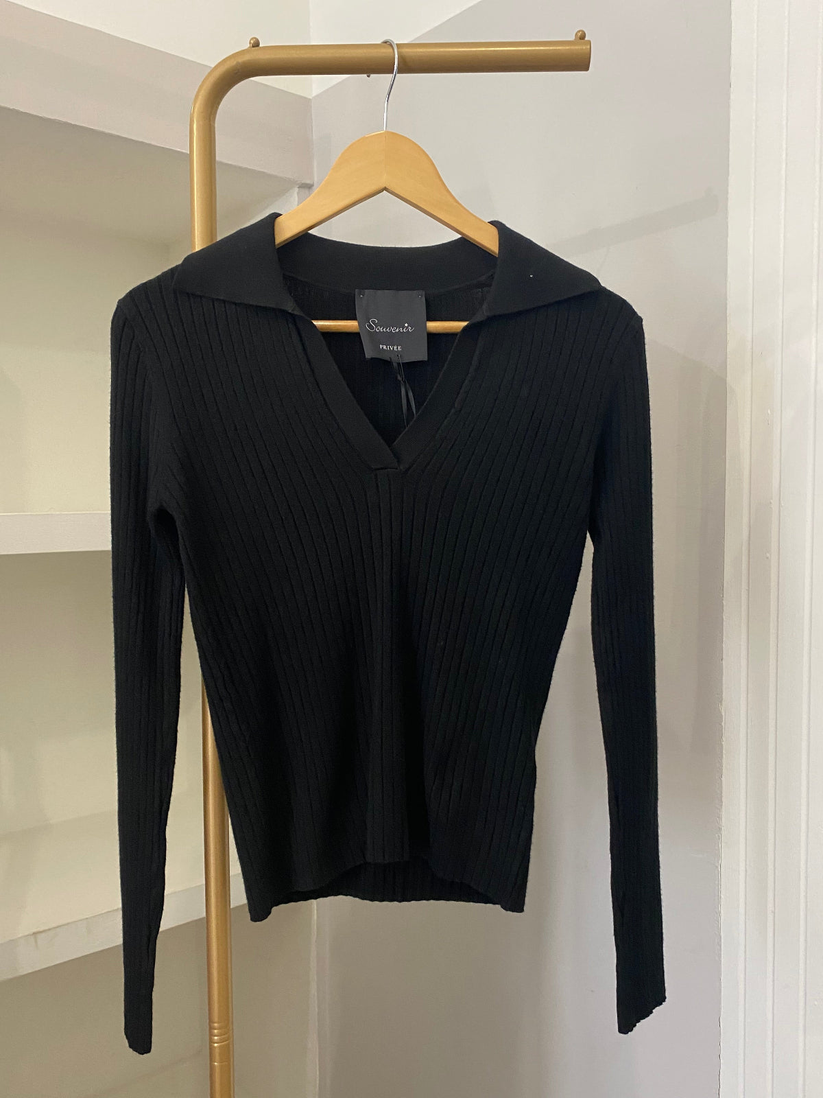 Souvenir polo in maglia nera