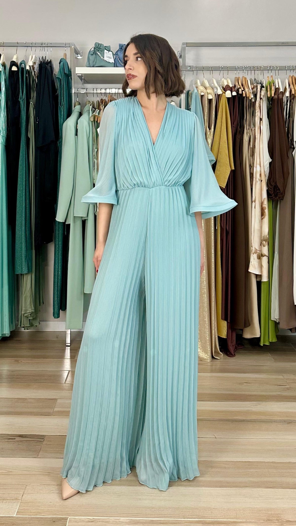 Souvenir tuta plissettata laterale